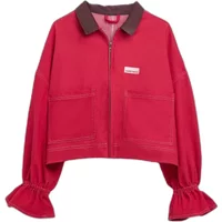 Red women's denim jacket by HappyMess with brown collar, front zipper, two large pockets, and ruffled cuffs.
