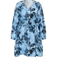Blue floral KAFFE Curve Aliana dress with long sleeves, V-neck, and tie waist.