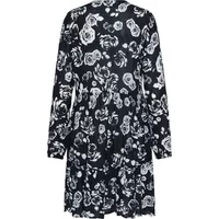Black and white floral long-sleeve dress with a fitted waist and knee-length hem.
