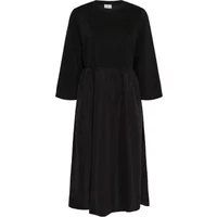 Black KAFFE KArosa women's dress with three-quarter sleeves and a flowing midi skirt.