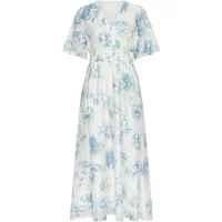 White Moss Copenhagen Evangelia women's dress with blue floral print, V-neck, and short flutter sleeves.