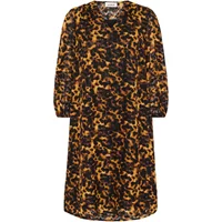 Leopard print women's dress by Soaked in Luxury, featuring long sleeves and a knee-length hem.