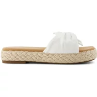 White TOMS Abby women's espadrilles with woven jute sole and knotted fabric upper.
