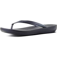 Women's black FitFlop Iqushion flip-flops with ergonomic TPU sole and textured footbed.
