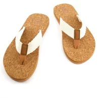 Women's flip-flops Sinner Maya II with cork sole, white fabric straps, and brown leather accents.