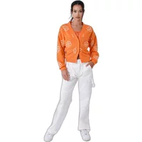 Orange women's sweater with white flowery sketch print, button-up front, and long sleeves by Project X Paris.