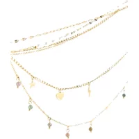Gold pearl bead necklace set with multiple chains and small pendants, including hearts and leaves.