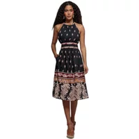 Black halter neck dress by Goddiva with patterned bodice and hem, sleeveless, knee-length, and fitted waist.