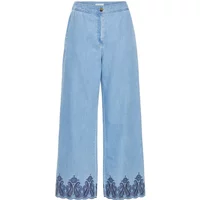 Light blue women's jeans with wide legs, high waist, and dark blue embroidered hem by Atelier Rêve Irharmony.