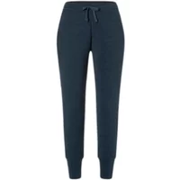 Navy blue women's joggers by Super.Natural, featuring a drawstring waist and cuffed ankles.