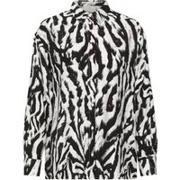 Black and white zebra print long sleeve blouse with a collared neckline by Kaffe.