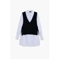 White long sleeve shirt with black sleeveless vest overlay, button-up front, and collar by Desigual.