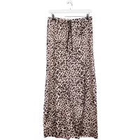 Leopard print loose trousers with drawstring waist, featuring a wide-leg design and brown-black pattern.