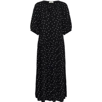 Women's black maxi dress with white polka dots, V-neck, and three-quarter sleeves by Soaked in Luxury.