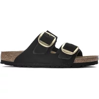 Black Birkenstock Arizona mules with two adjustable straps and gold buckles on a cork footbed.