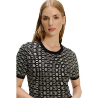 Black and white patterned women's pullover with short sleeves and round neckline.
