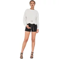 White women's pullover with drawstring hem, long sleeves, and relaxed fit.