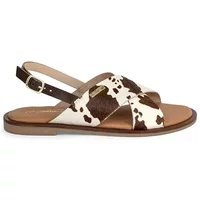 Brown and white cow print women's sandals with crisscross straps and adjustable ankle buckle by Les Tropeziennes par M.Belarbi.