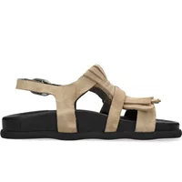 Beige women's sandals with fringes, black sole, and adjustable ankle strap by Shabbies Amsterdam.