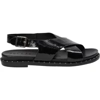 Black Sofie Schnoor Margotsw women's sandals with crisscross straps, ankle buckle, and studded sole.