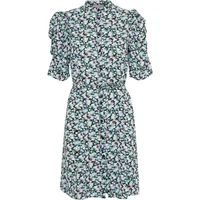 Floral women's shirt dress by Ichi Nina Dr with puff sleeves, button-up front, and a belted waist.