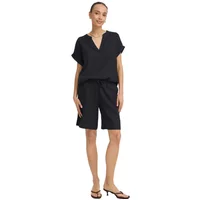 Black women's short viscose set by b.young, featuring a V-neck top and knee-length shorts, worn with black sandals.