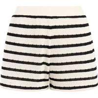 Women's shorts Protest Cabin, white with black horizontal stripes, textured fabric, elastic waistband.