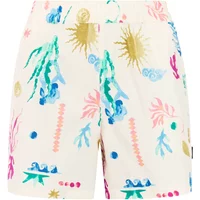 Women's shorts with colorful abstract patterns on a white background, featuring sun and leaf motifs.