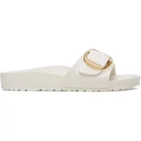 White Birkenstock Madrid slide sandal with large gold buckle and contoured footbed.