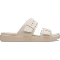 Beige Crocs Brooklyn Low Low women's slides with two wide straps and adjustable buckles.
