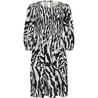Black and white zebra print smocked dress with three-quarter sleeves and round neckline by Kaffe.