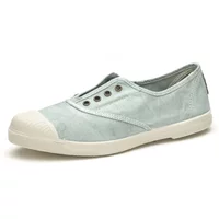 Light blue women's sneakers with white rubber toe cap, slip-on style, and metal eyelets.