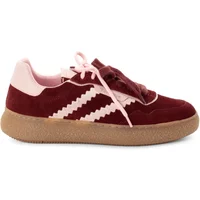 Burgundy and pink Tamaris women's sneakers with zigzag stripes and gum sole.