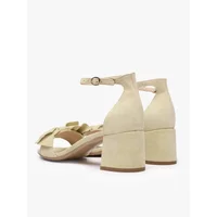 Beige suede leather sandals with ankle strap, block heel, and decorative bow by Ryłko.