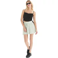 Women's light green tie-dye shorts by 24 Colours, featuring a high waist and adjustable front tie.