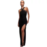 Black Goddiva halter dress with crisscross neckline and thigh-high slit.