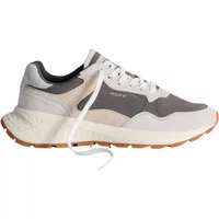 White and gray women's trainers by Hoff with suede accents, gum sole, and white laces.