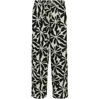 Black and white floral patterned women's trousers with elastic waistband and straight leg design by Regatta Elbrie.