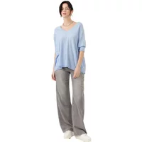 Light blue women's V-neck pullover by Artlove Hesalia, loose fit, three-quarter sleeves, paired with gray pants.