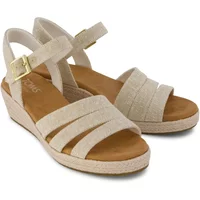 Beige TOMS Julia women's wedge sandals with ankle strap, buckle closure, and textured sole.