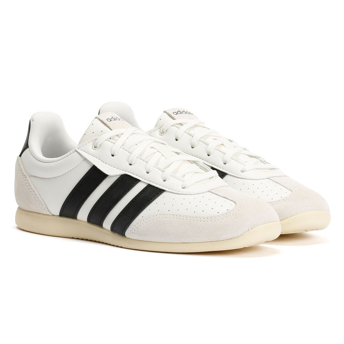 Beige Adidas Barreda Lo women's trainers feature a sleek design with black stripes, a mix of leather and suede materials, and a classic low-top silhouette.