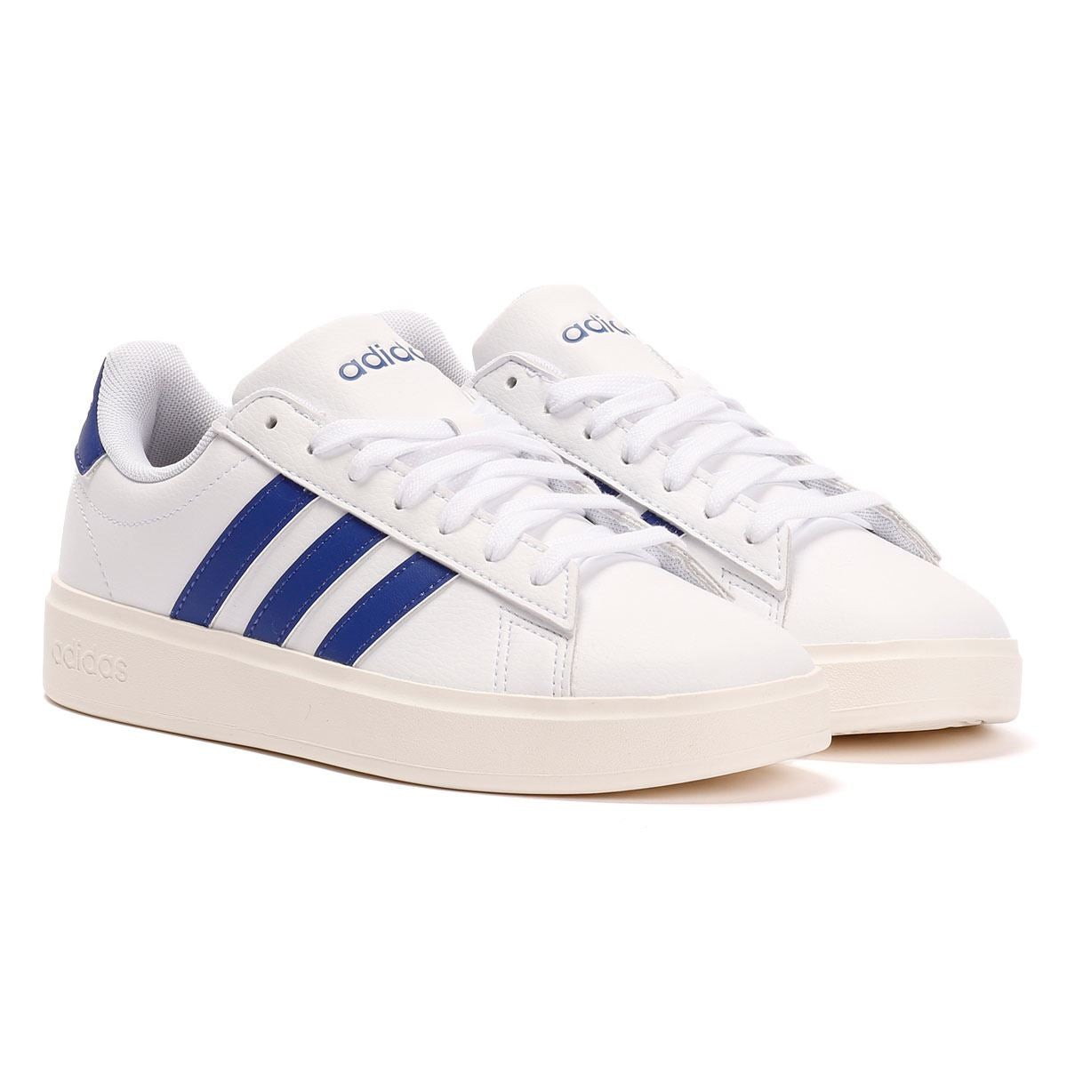 White leather trainers featuring three blue stripes on the sides, a textured rubber sole, and a padded collar for comfort.