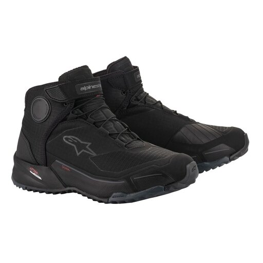 Black Alpinestars CR-X Drystar shoes in size 9.5 US feature a sleek design with a high-top silhouette, textured material, and prominent logo on the side.