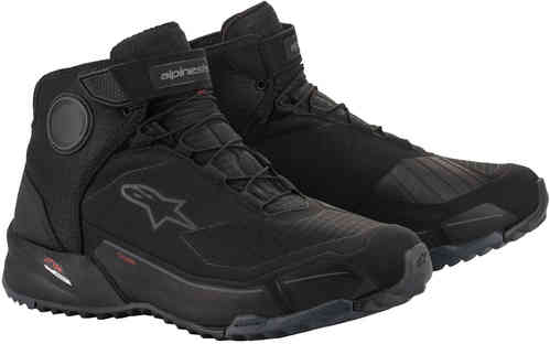 Black Alpinestars CR-X Drystar motorcycle shoes featuring a high-top design, textured material, lace-up front, and a secure ankle strap for enhanced protection and comfort.