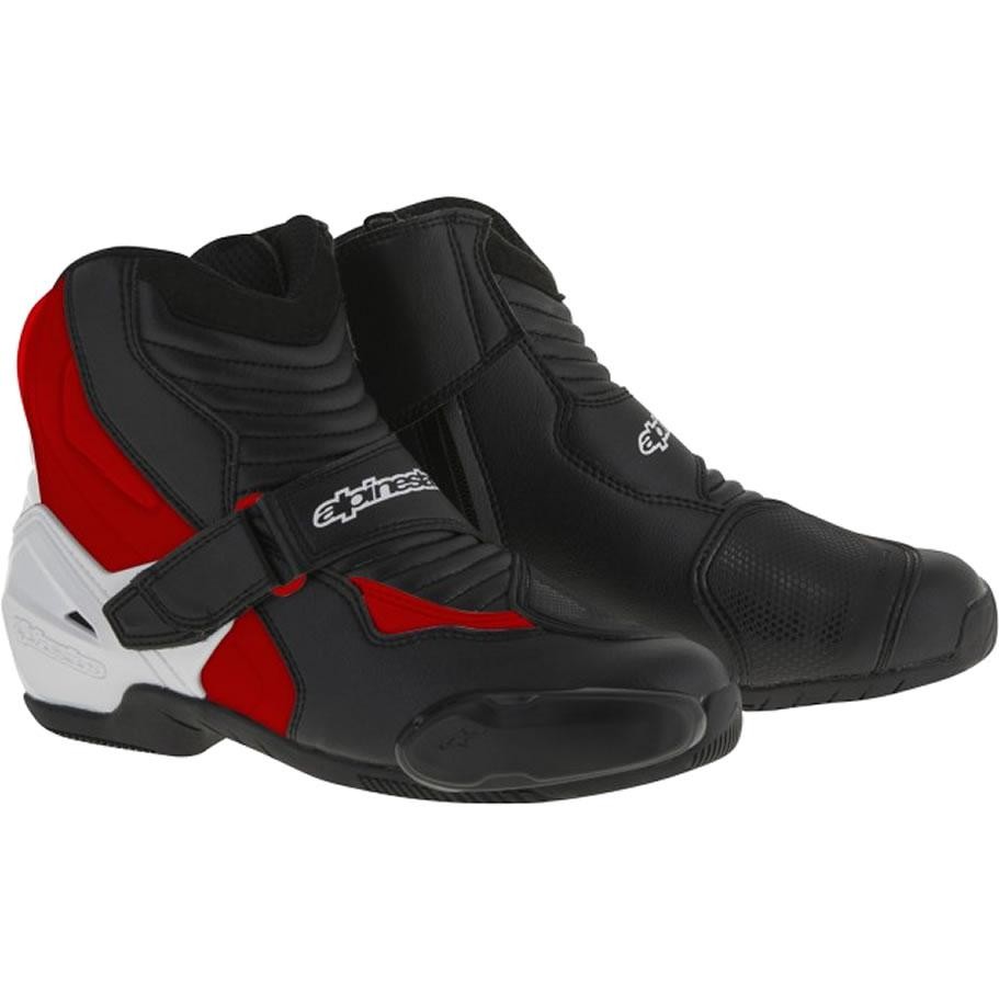 Black and red Alpinestars SMX-1 R motorcycle boots with a sleek design, featuring a Velcro strap, textured synthetic material, and a white logo on the side.