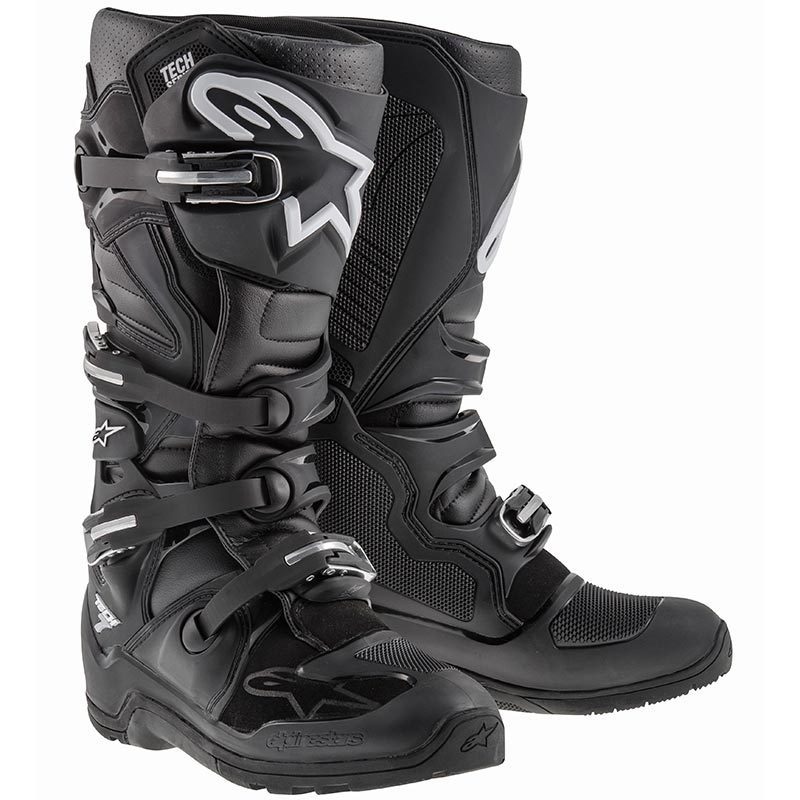Black Alpinestars Tech 7 Enduro Motocross Boots with multiple adjustable buckles, textured panels, and a prominent white star logo, designed for durability and performance.