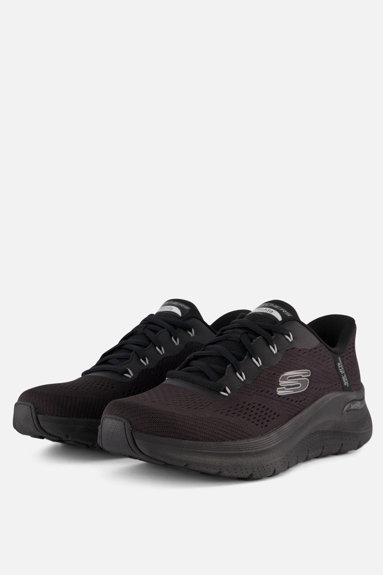 Black Skechers Men Arch Fit 2.0 Lestur Trainers featuring a breathable mesh upper, cushioned sole, and signature logo on the side, available in size 10.