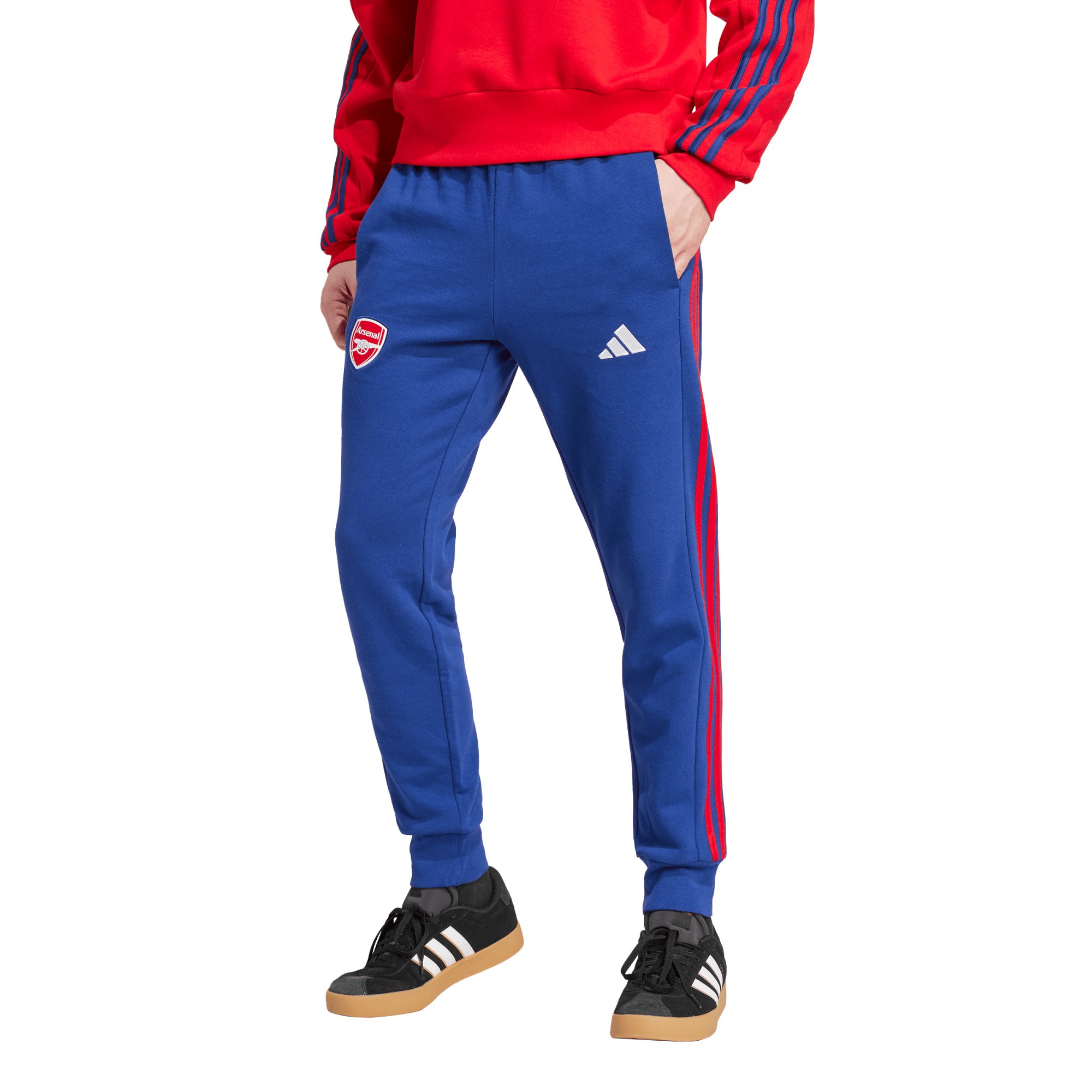 Victory blue pants with red side stripes, featuring the Arsenal logo and Adidas branding, made from soft material, designed for comfort and style.