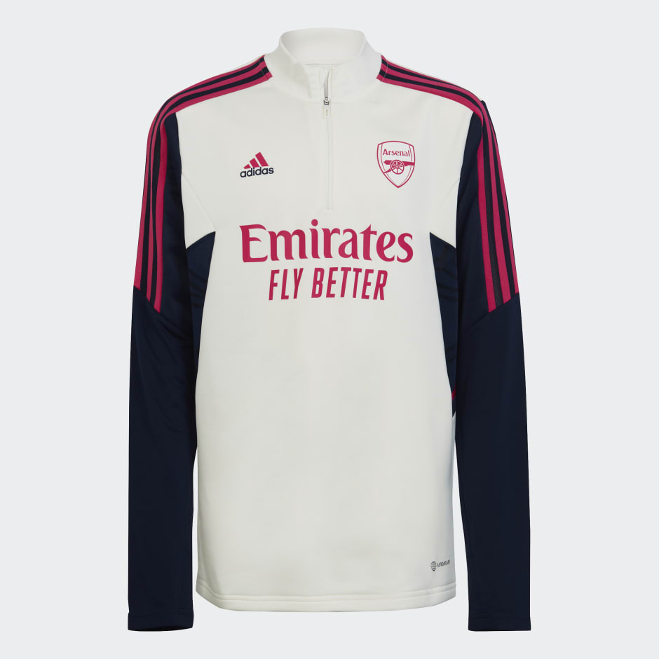 Off-white training top with collegiate navy sleeves, featuring a half zip, Adidas logo, Arsenal crest, and "Emirates Fly Better" branding in pink.