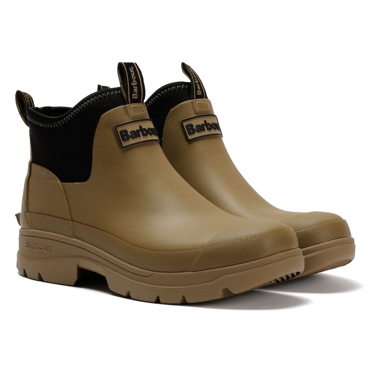 Tan ankle Wellington boots with a rubber exterior, featuring a black elastic side panel and Barbour branding on the front and heel.